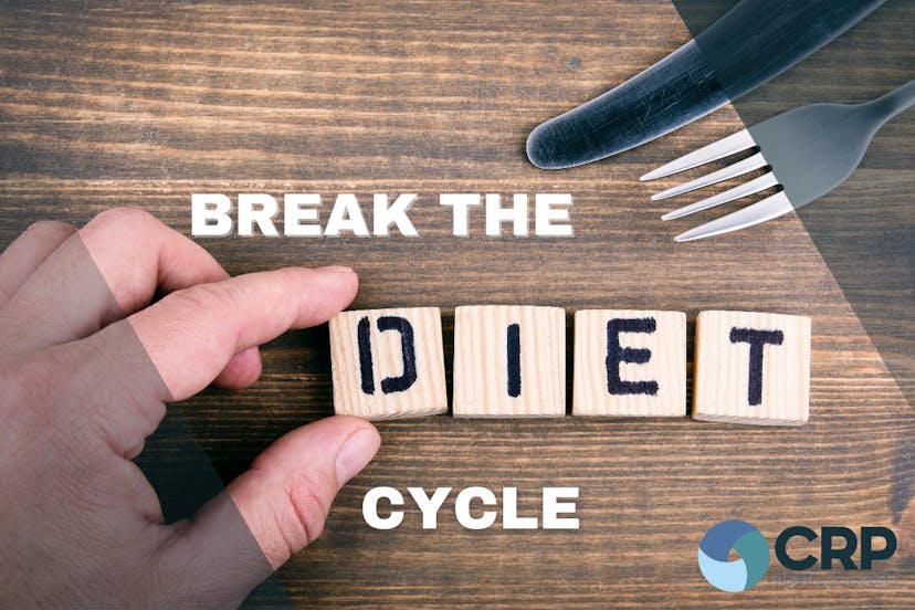 Photo of a table with a knife and fork and someone's hands. The caption reads "break the diet cycle" with the word "diet" being made out of scrabble pieces, which the hand is adjusting.